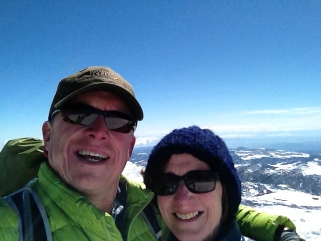 The family that explores together ... Chuck Millsaps and wife Kim atop Colorado's Pikes Peak.