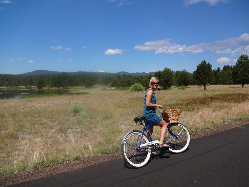 Pausing on a ride in Sun River, Oregon. That's Mt. Hood in the distance.